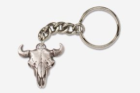 A silver key chain with a bull skull on it.