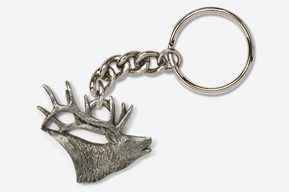 A silver key chain with a deer head on it.