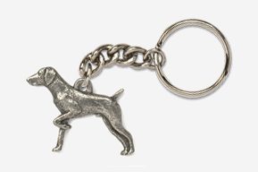 A silver dog keychain with a chain link ring.