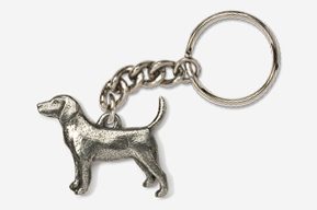 A silver key chain with a dog on it.