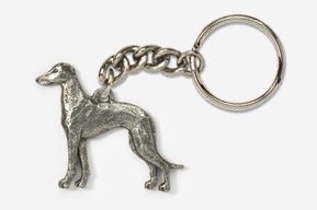 A silver key chain with a dog on it