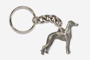 A silver key chain with a greyhound dog on it.