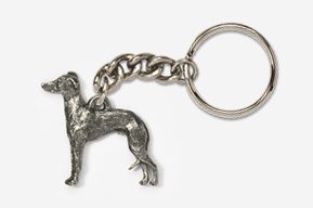 A silver key chain with a dog on it.