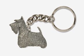 A silver dog keychain with chain