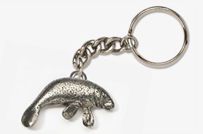 A silver key chain with an animal on it.