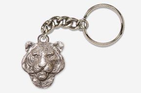 A silver tiger head keychain is shown.