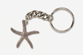 A silver key chain with a starfish on it.