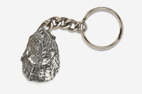 A silver key chain with a metal object on it.