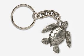 A silver turtle keychain with chain attached to it.