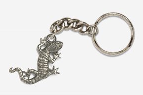 A silver lizard keychain with chain attached to it.