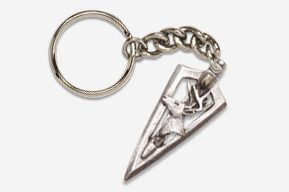 A key chain with a silver arrow on it.