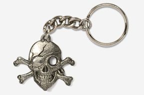 A keychain with a skull and crossbones on it.