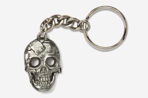 A silver skull keychain with a chain.