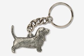 A silver dog keychain with chain