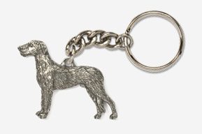 A silver key chain with a dog on it.