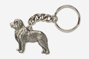 A silver key chain with a dog on it