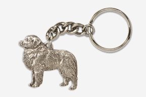 A silver key chain with a dog on it