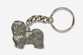 A silver key chain with a picture of an animal.