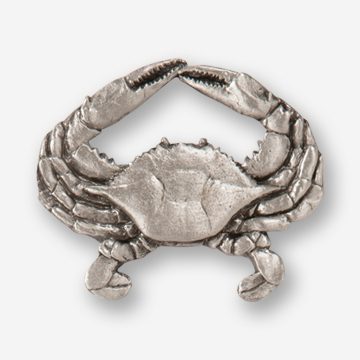 A silver crab is shown in this picture.