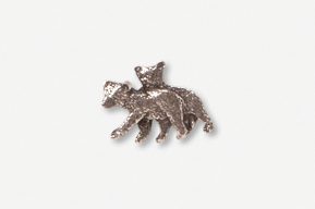 A silver bear and cub pin on a white surface.