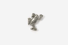 A silver frog pin is shown here.