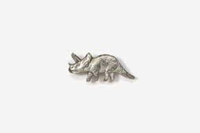 A silver rhino pin with the head down.