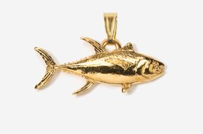 A gold fish pendant is shown in this picture.