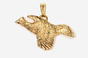 A gold eagle pendant is shown in this image.