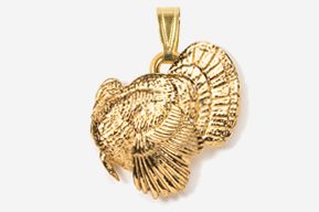 A gold turkey pendant is shown.