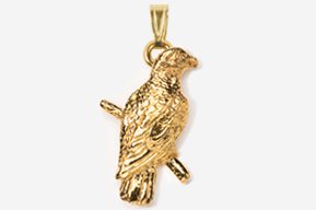 A gold bird sitting on top of a tree branch.