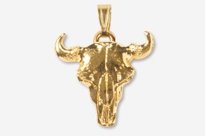 A gold bull skull pendant is shown.