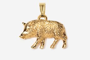 A gold pig charm is shown in this picture.