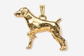 A gold plated dog pendant is shown.