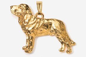 A gold plated dog pendant is shown.