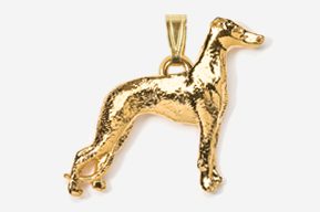 A gold plated dog pendant is shown.