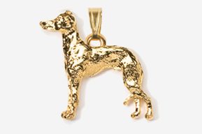 A gold plated dog pendant with a chain.