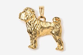 A gold plated dog pendant is shown.