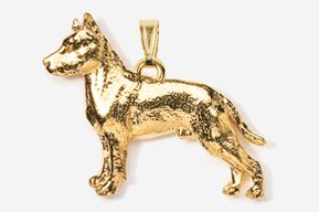 A gold plated dog pendant is shown.