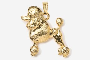 A gold poodle dog pendant is shown.