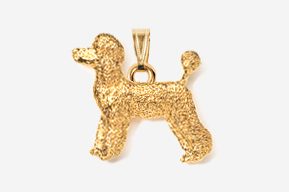 A gold poodle dog pendant is shown.