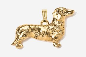 A gold plated dog pendant is shown.