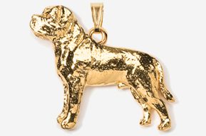 A gold plated dog pendant is shown.