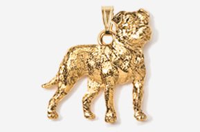 A gold plated dog pendant is shown.