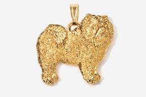 A gold colored dog pendant is shown.