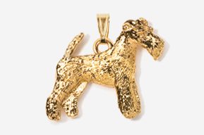 A gold plated dog pendant with a textured finish.