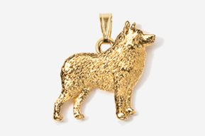 A gold plated dog pendant with a chain.