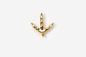 A gold colored piece of jewelry with an arrow on it.