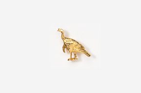 A gold bird is standing on its hind legs.