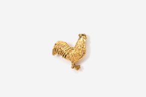 A gold rooster pin on a white background