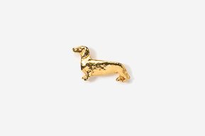 A gold plated dachshund dog pin.